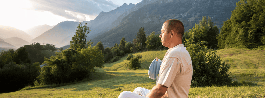 Man chanting on a mountain